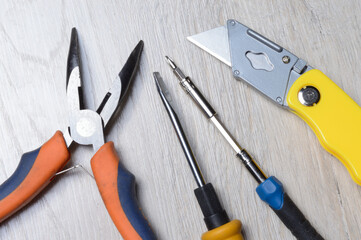 tools for minor home repairs are on the countertop. view from above.