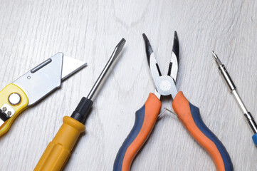 tools for minor home repairs are on the countertop. view from above.