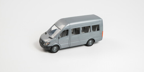 Obraz na płótnie Canvas Plastic toys. Car model on a white background. The body of the van.