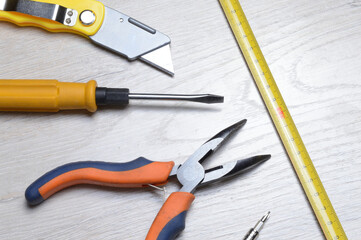tools for minor home repairs are on the countertop. view from above.