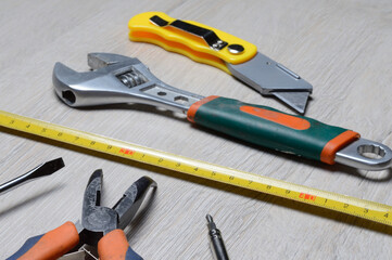tools for minor home repairs are on the countertop. view from above.