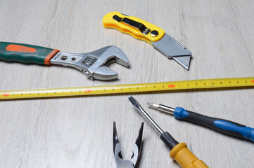 tools for minor home repairs are on the countertop. view from above.