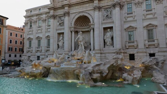 The Trevi Fountain in Rome, Italy, famous Baroque style city landmark from 1762, tilt up