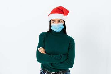 Fototapeta na wymiar Quarantine restrictions and wearing a mask for Christmas