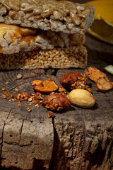 Kozinaki of sesame on the wooden background