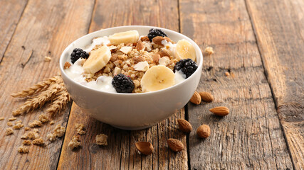 bowl of granola, yogurt and fruit