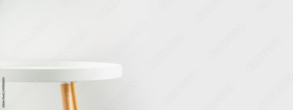 Poster banner empty modern round white table top at white house wall,mockup space background for display or