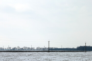 Fototapeta na wymiar winter landscape with field and snow