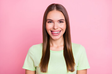 Photo of funny flirty young lady wear green t-shirt licking lips isolated pastel pink color background