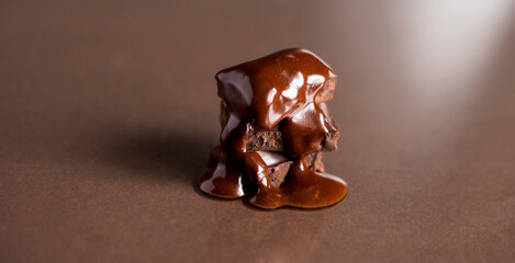 Chunks of chocolate in hot chocolate. Melted chocolate.