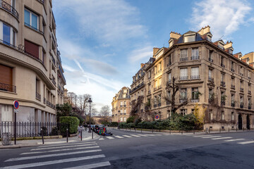 Paris, France - February 19, 2021: Beautiful buildings and typical parisian facades in the 8th...
