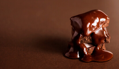 Chunks of chocolate in hot chocolate. Melted chocolate.