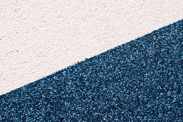 Duotone stucco wall texture as grunge background and urban detail