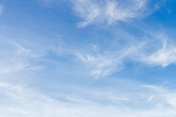 White clouds in a bright blue sky. The beauty of the nature