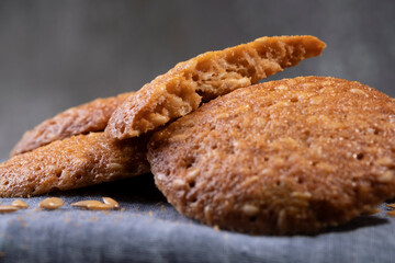 Homemade sesame cookies close-up. Broken cookies
