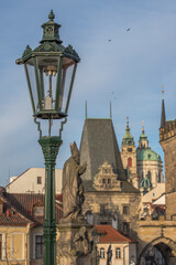 Fototapeta na wymiar gas lamp on the charles bridge / Prague, Czech Republic