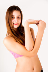 Fototapeta premium Pretty young woman doing fitness exercise