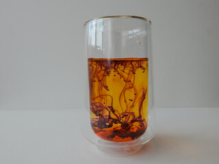 water in a glass colored with manganese, beautiful patterns