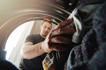 Young man doing housework