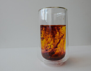 water in a glass colored with manganese, beautiful patterns