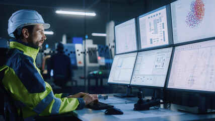 Industry 4.0 Modern Factory: Facility Operator Controls Workshop Production Line, Uses Computer...