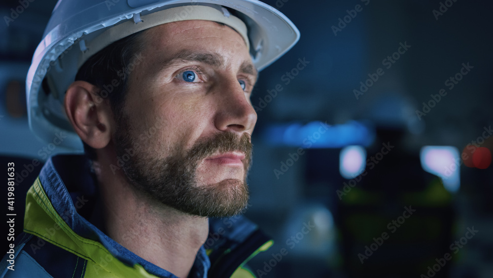 Poster Industry 4.0 Modern Factory: Portrait of Facility Operator Controls Workshop Production Line, Uses Computer with Screens Showing Complex UI of Machine Operation Processes, Controllers