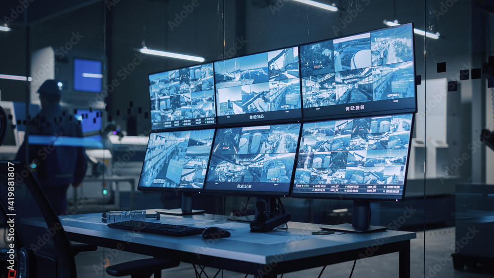 Aufkleber industry 4.0 modern factory: security control room with multipoke computer screens showing surveilla