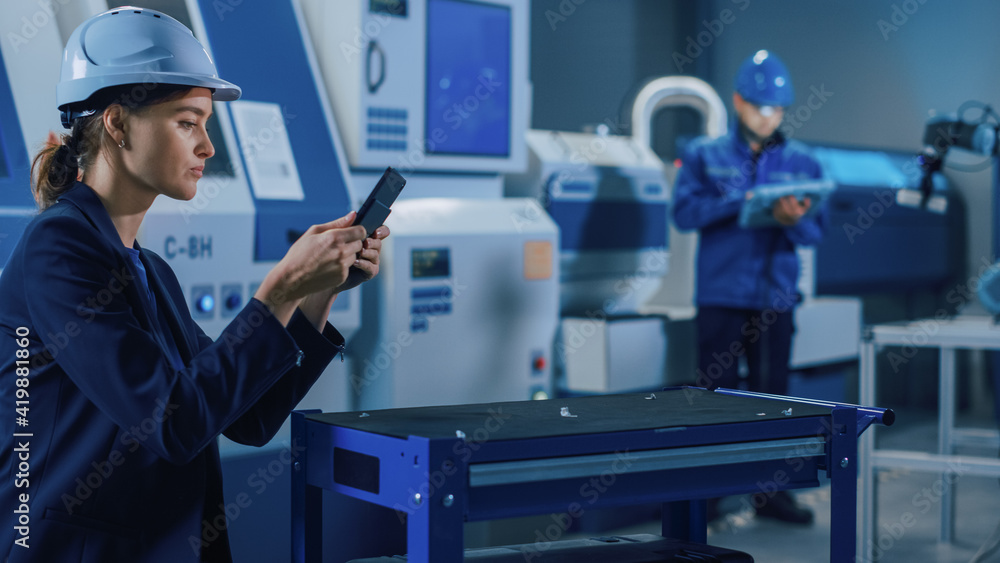 Aufkleber Portrait Shot of Professional Female Engineer Uses Industrial Digital Tablet to Work with Augmented Reality. Great Template Shot for Augmented Reality. Factory Workshop with CNC Machinery.
