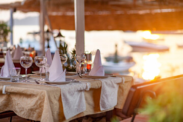 Romantic empty setting on seaside  at sunset.