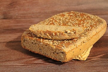 Homemade bread with grains, bread baked in a mold, sunflower seeds and pumpkin seeds, fresh bread