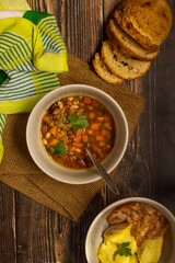 Lentil, beans and chickpeas soup with soda bread and baked potato