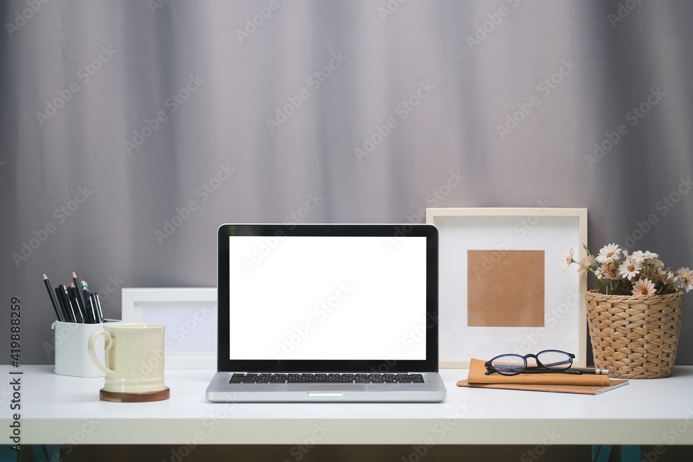 Poster modern workspace with computer with blank screen and equipment on white table.blank screen for your 