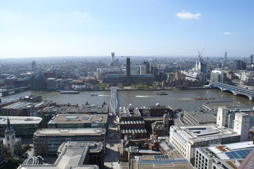 London, UK: panoramic view of the city from the Golden Gallery of St. Paul's Cathedral, with the Millennium Bridge in the background