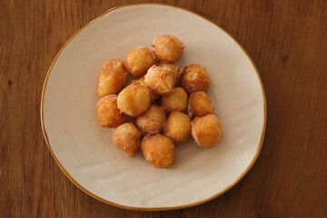 Typical Carnival italian Fritters, Sweet Dough Balls with Icing Sugar, Italy