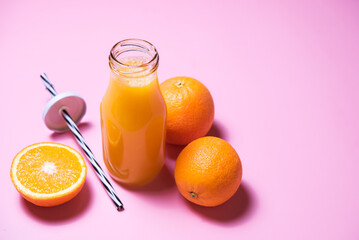 Orange juice in a glass bottle.