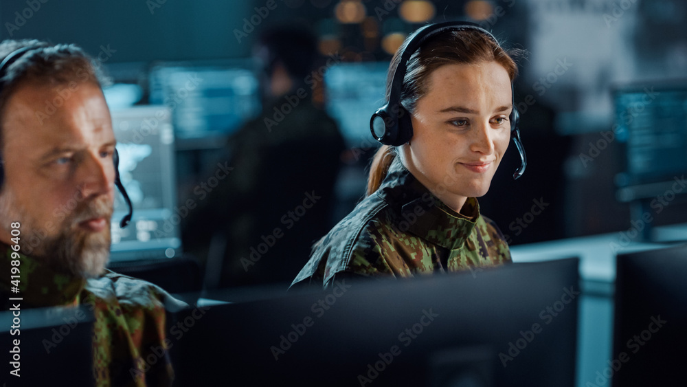 Poster military surveillance team of officers in headsets working in a central office hub for cyber operati