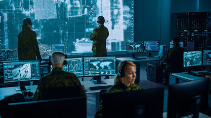 Military Surveillance Team of Officers Locked a Target on a Vehicle from a Satellite and Monitor it...