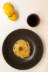 Italian spaghetti with bergamot sauce on top