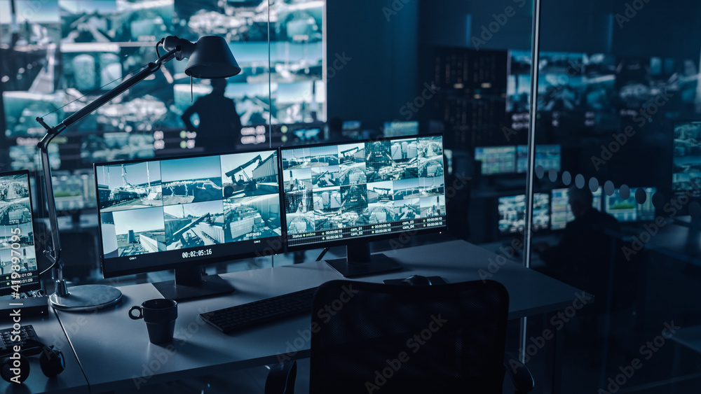 Poster Two Digital Computer Screens with Surveillance CCTV Video in a Harbour Monitoring Center with Multiple Cameras on a Big Digital Screen. Employees Sit in Front of Displays with Big Data