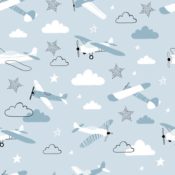 Vector hand-drawn seamless repeating children simple pattern with aircraft, stars and clouds in Scandinavian style on a blue background.Kids seamless pattern with planes. Funny airplanes.
