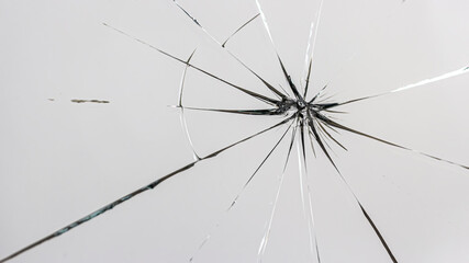 Cracks on the glass on a white background.