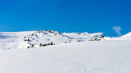Fototapeta na wymiar snow covered mountains in Bucegi mountain range
