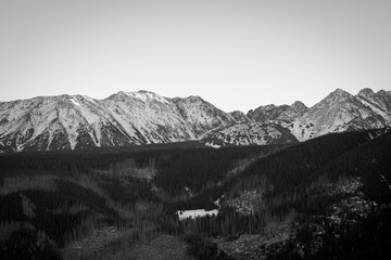 Monochrome Tatra Mountain view seen from Nosal Peak. December in Tatra National Park, Poland. Selective focus on the peaks, blurred background.