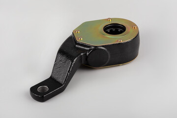 Slack adjuster.Brake slack adjuster on the gray background. Truck parts. Car parts. Parts on the gray background. Ratchet.