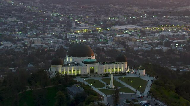Amazing view of the Griffith Observatory in Mount Hollywood. Crowded entrance lawn&nbsp;and observation deck. Los Angeles, California. Beautiful sky during sunset. Shot on Red Weapon 8K.

