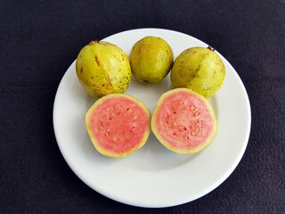 Very large common guava fruit (Psidium guajava) Myrtaceae family. Amazon, Brazil.