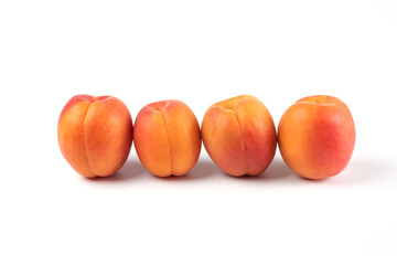 Peaches isolated on white background in geometric position
