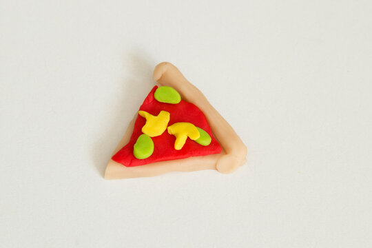 Making pizza game step by step with play dough for children's activity in the school art lesson and plasticine concept.