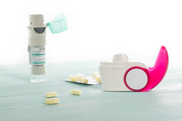 Set of asthma inhaler, anti-allergy pills and aerosol machine with inhaler mask,concept asthma and...