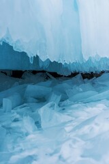 The foot of the ice cave. Beautiful colored icicles cover the rock.